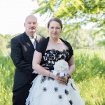 Portrait des Brautpaares schwarz/weißes Brautkleid Malag